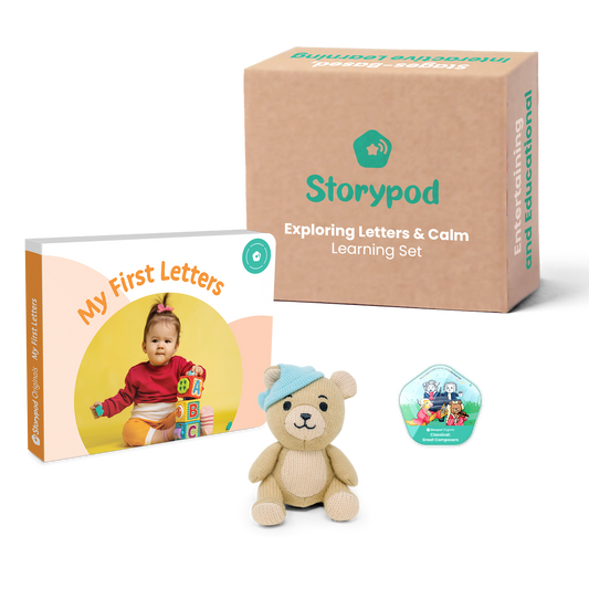 Storypod learning set with a book, teddy bear, and interactive game piece.