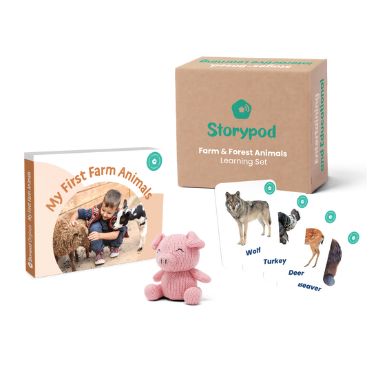 Storypod learning set with farm animal cards and plush pig toy.